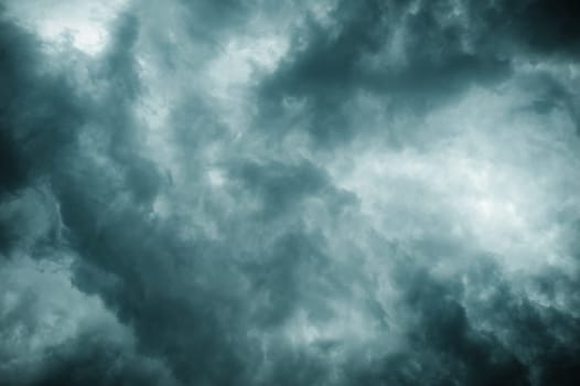 Thick dark black storm clouds covering summer sunset sky with gale-speed wind blowing just before Nor'westers Kalbaishakhi Bordoisila thunderstorm torrential rain. Atmospheric Texture background.