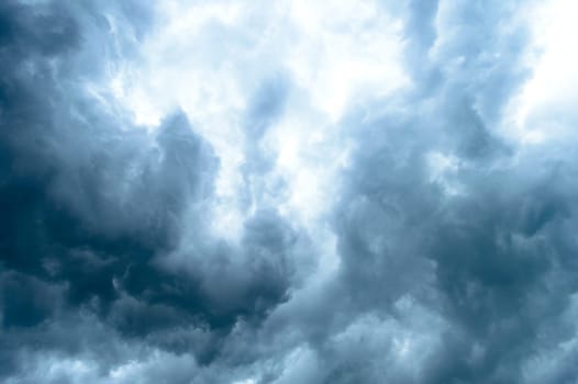 Thick dark black storm clouds covering summer sunset sky with gale-speed wind blowing just before Nor'westers Kalbaishakhi Bordoisila thunderstorm torrential rain. Atmospheric Texture background.