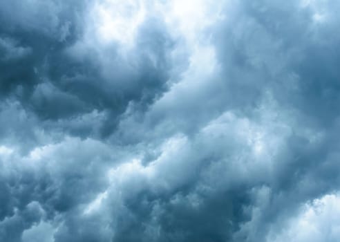 Thick dark black storm clouds covering summer sunset sky with gale-speed wind blowing just before Nor'westers Kalbaishakhi Bordoisila thunderstorm torrential rain. Atmospheric Texture background.