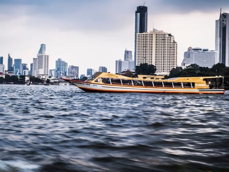 January 2019,Bangkok Thailand river of Bangkok and skyscrapper highrise building cityscape riverscape taxi boat serve for public transportation