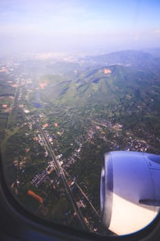 Sky view from airplane. Aerial view from windows. Transportation Concept.