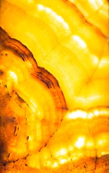 Architectural detail of an antique alabaster stone sheet. Alabaster is translucent enough to be used for small windows. It was used for this purpose in Byzantine churches. Image useful for an elegant background.