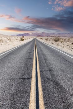 Route 66 in the desert with scenic sky. Classic vintage image with nobody.