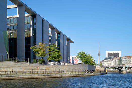 Government district in Berlin with the Marie-Elisabeth-Lueders-Haus at the river Spree and the television tower in the background