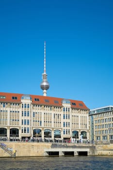 City view of Berlin with television tower in background seen from Spree river