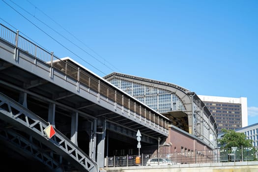 The historic train station Friedrichstrasse in Berlin also called the Palace of Tears seen from the river Spree