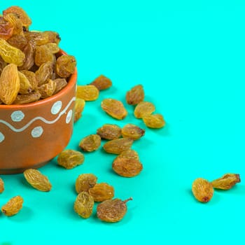 Dried Raisins in a clay Bowl