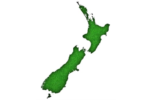 Map of New Zealand on green felt