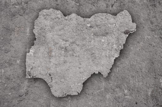 Map of Nigeria on weathered concrete