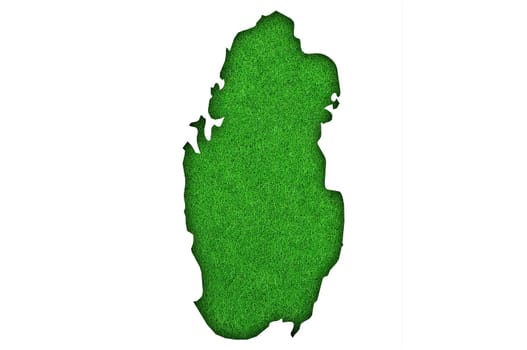 Map of Qatar on green felt