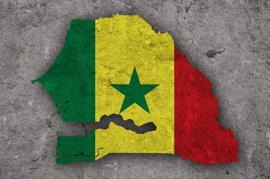 Map and flag of Senegal on weathered concrete