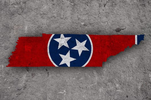 Map and flag of Tennessee on weathered concrete