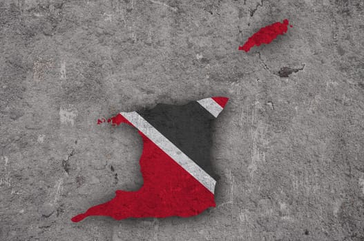 Map and flag of Trinidad and Tobago on weathered concrete