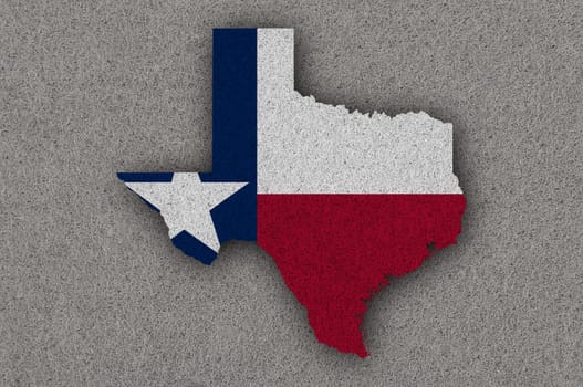 Map and flag of Texas on felt