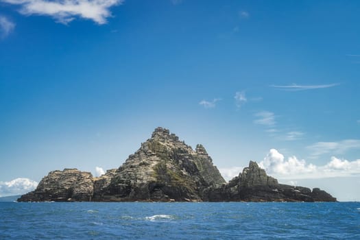 Little Skellig a rocky island on Atlantic Ocean close to Irish shore, habitat for thousands of seabirds Gannet, Morus Bassanus, Ring of Kerry, Ireland