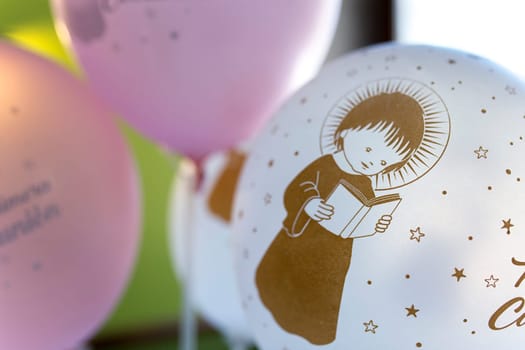 Soft balloons as first communion for tables. Decoration items for first comunion