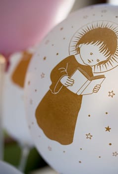 Soft balloons as first communion for tables. Decoration items for first comunion