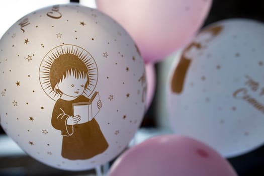 Soft balloons as first communion for tables. Decoration items for first comunion