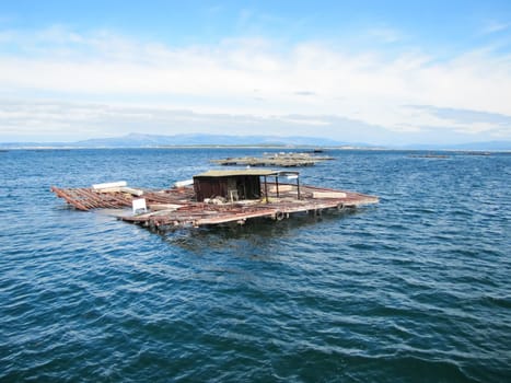 A fishing raft. Pridive fishing piers and rafts to install nets and storage gear.