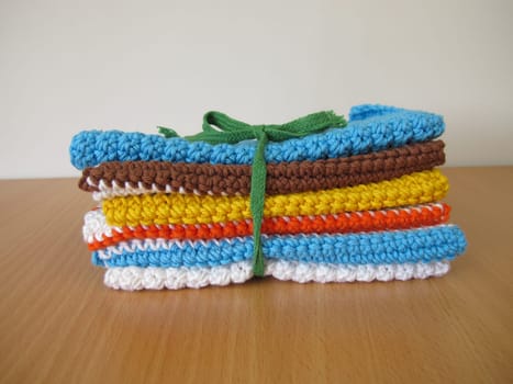 Reusable and washable crocheted and knitted dishcloths from wool, cotton and wool scraps
