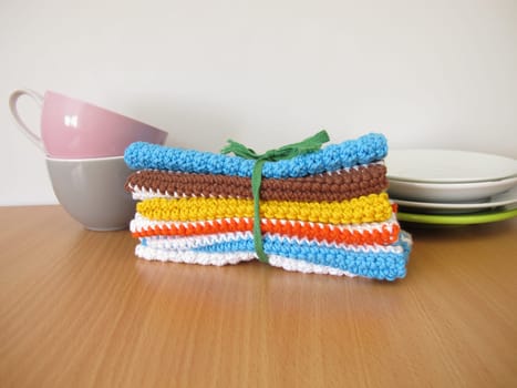 Reusable and washable crocheted and knitted dishcloths from wool, cotton and wool scraps