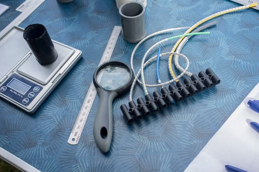 Bird ringing or bird banding equipment. Ruler, digital scale and banding pilers
