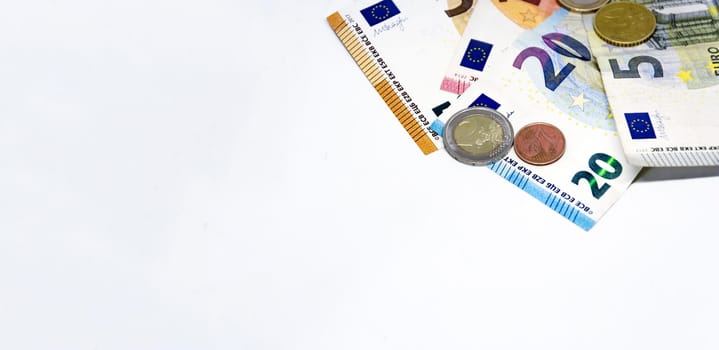 European Union coins and banknotes of different values. The euro is the European currency. Finance, economy and business. Cash and savings