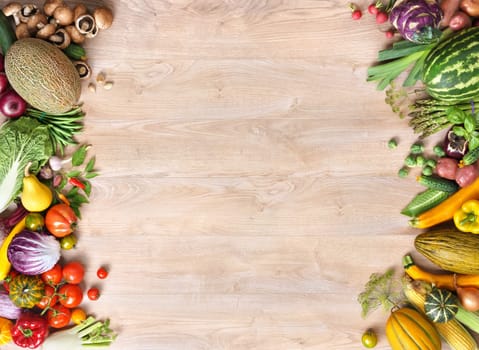 Healthy food background / studio photo of different fruits and vegetables on old wooden table