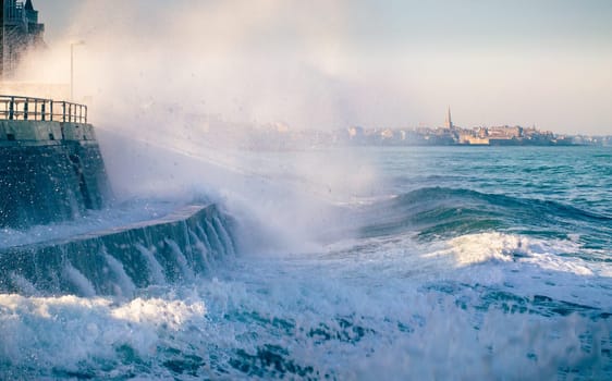 High tide and splashing wave in Saint Malo, Brittany, France