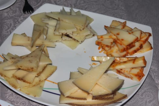 beautiful cheeses of different variety and flavor types
