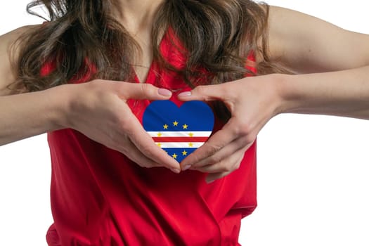 Love Cape Verde The woman holds a heart in the form of the flag of Cape Verde on her chest. Concept of patriotism.