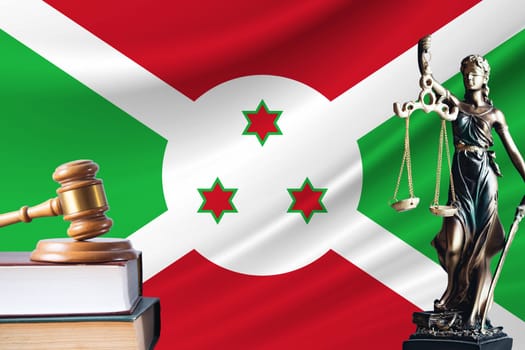 Law and justice in Burundi. Statue of themis and the gavel of the judge against the background of the flag of Burundi. Law and justice concept.