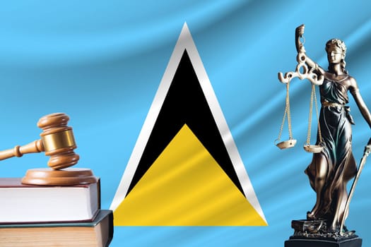 Law and justice in Saint Lucia. Statue of themis and the gavel of the judge against the background of the flag of Saint Lucia. Law and justice concept.