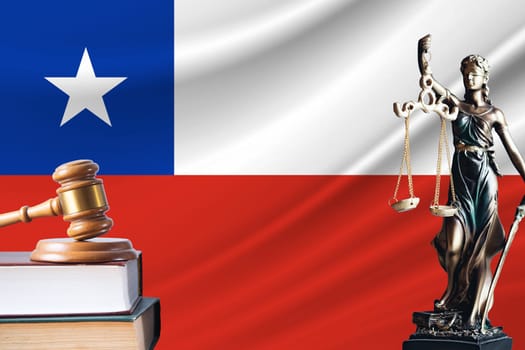 Law and justice in Chile. Statue of themis and the gavel of the judge against the background of the flag of Chile. Law and justice concept.