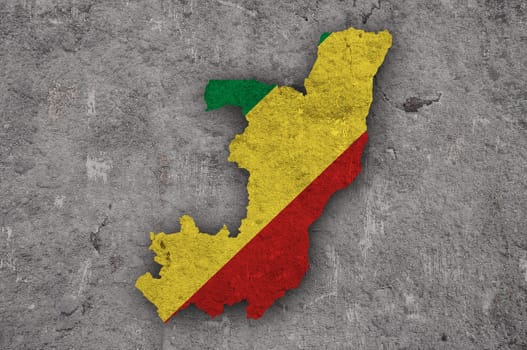 Map and flag of Republic of the Congo on weathered concrete