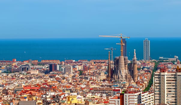 Aerial Panorama view of Barcelona city skyline and Sagrada familia at dusk time,Spain
