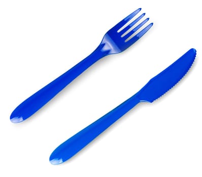 The colored plastic fork and knife isolated on white background.. Top view