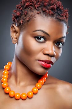 Black beauty with short spiky red hair
