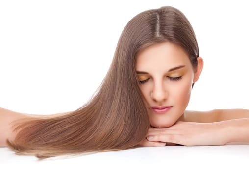Beautiful young brunette with long straight hair