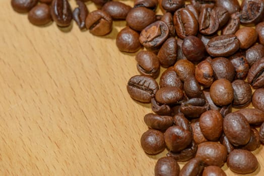 Macro of several toasted coffee seeds