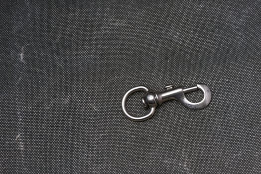 A Carabiner on a texile background
