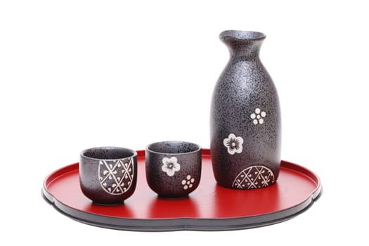 Japanese sake bottle and cup on tray