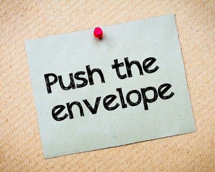 Word of mouth Message. Recycled paper note pinned on cork board. Concept Image