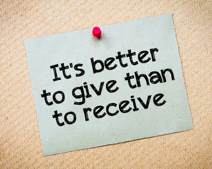 Word of mouth Message. Recycled paper note pinned on cork board. Concept Image