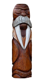 The wooden idol statue of koryak on a white background