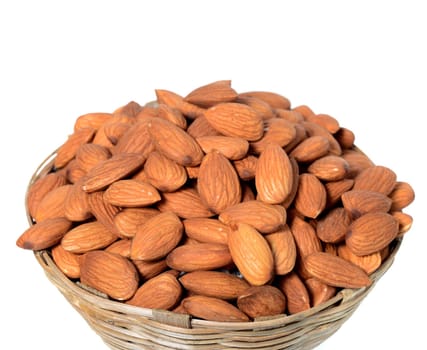 Almonds in a wooden basket with heap isolated on a white background