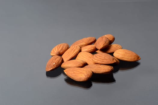 tasty Almonds on a dark background