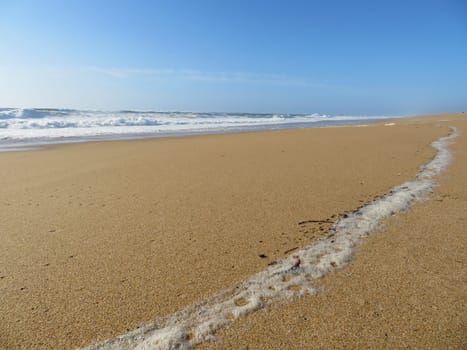 beautiful beach with the sea and its heat waves sun sky water salt air