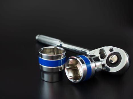 block wrench set and ratchet wrench on a black background.Block wrench set on a black background.