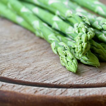 fresh green asparagus from an asparagus field as an ingredient in a kitchen